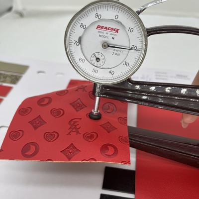 PU پوست مصنوعی فشرده شده برای کیسه کفش بسته بندی تخته میز پارچه پوست مصنوعی ساختگی